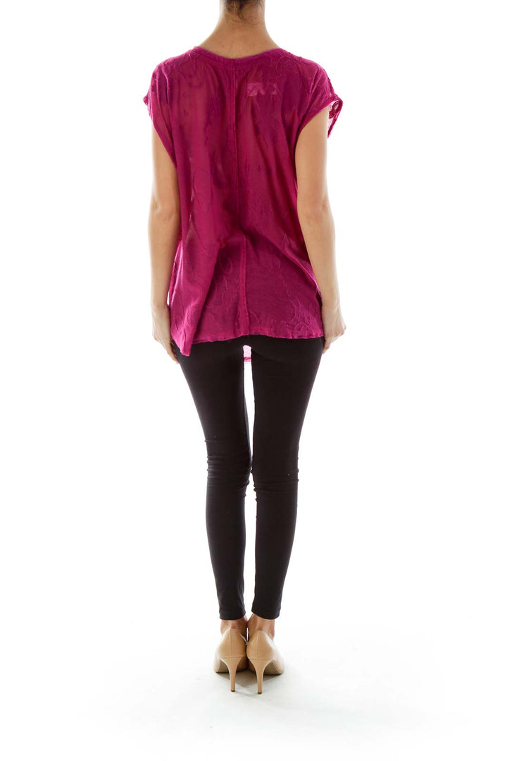 Back view of Free People magenta embroidered cap sleeve top on model