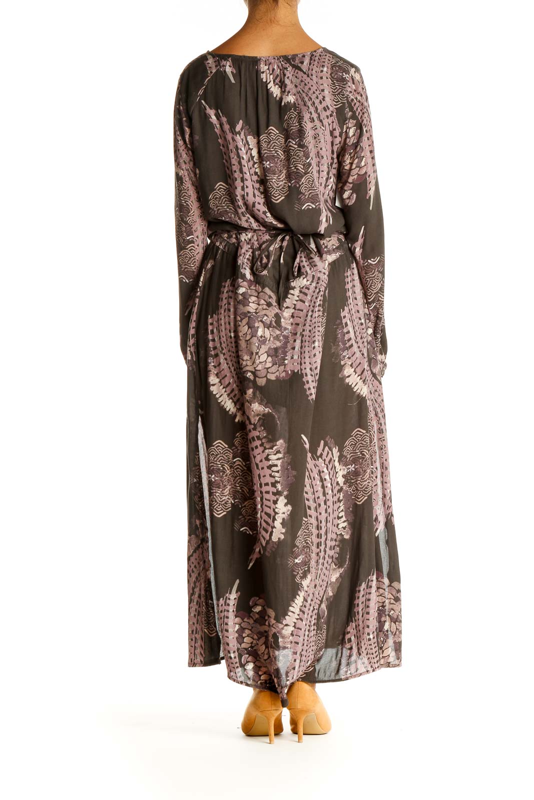Back view of Free People brown paisley maxi dress showing flowing silhouette and pattern details