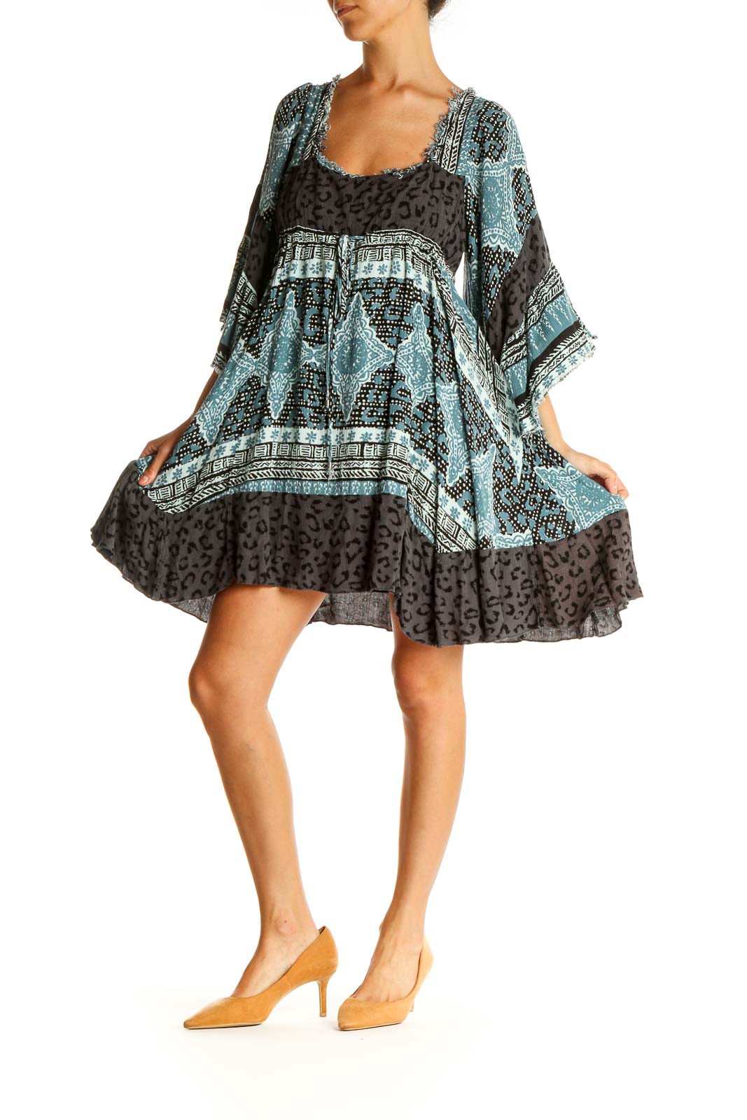 Front view of Free People blue and black patterned boho mini dress with bell sleeves