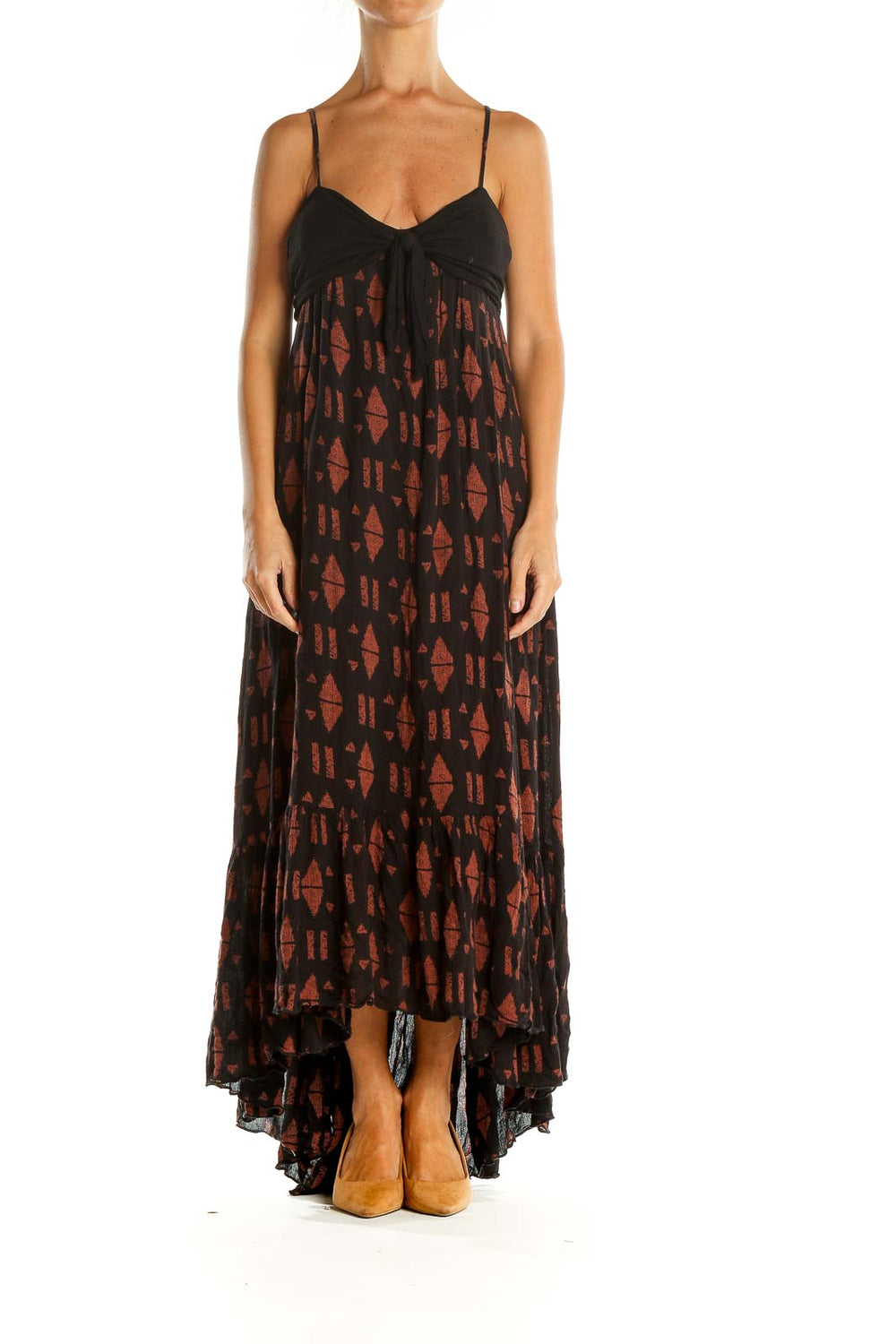 Front view of Free People black and rust geometric print maxi dress with twisted front detail