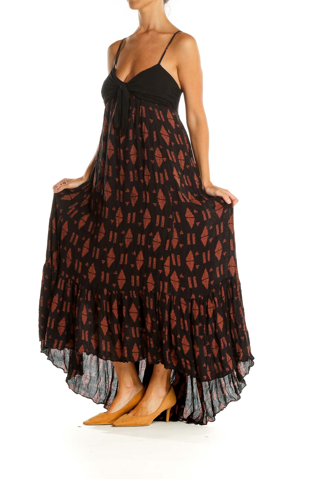 Front view of Free People black and rust geometric print maxi dress with twisted front detail