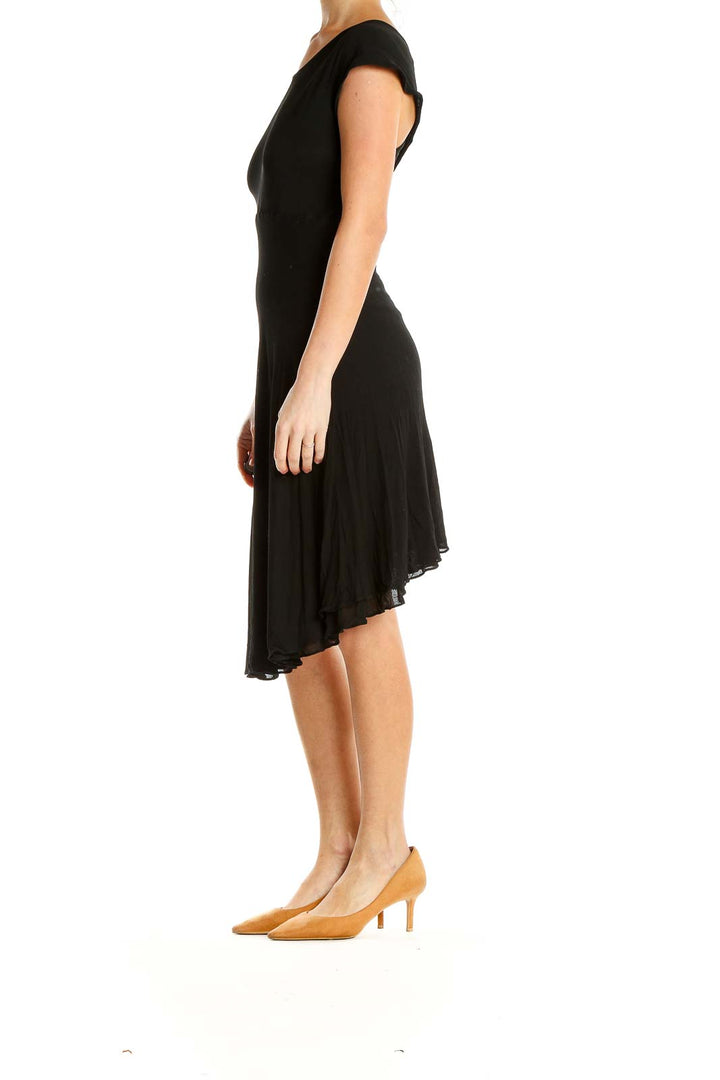 Front view of Donna Karan New York black cap sleeve midi dress with flowy skirt