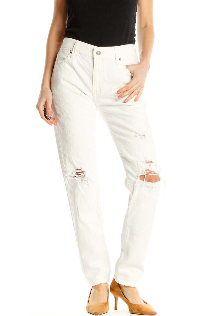 Front view of white distressed straight-leg jeans by Polo Ralph Lauren
