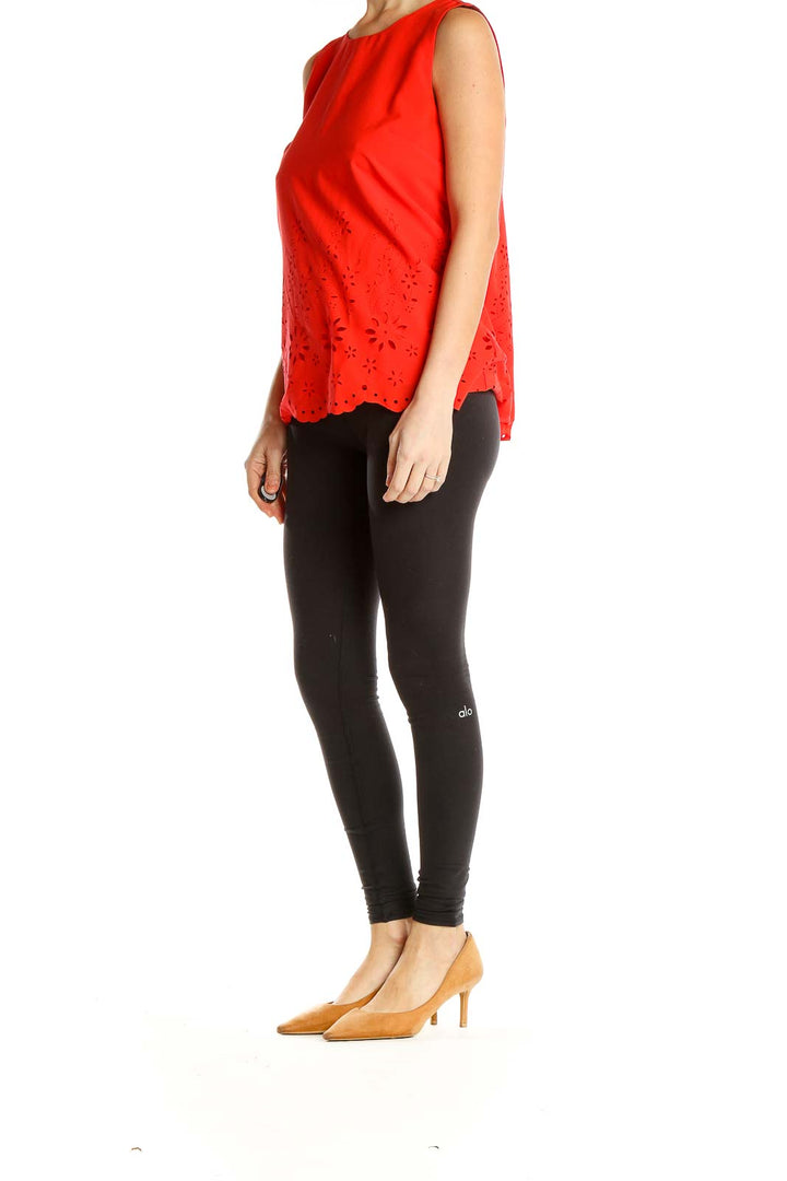 Front view of red sleeveless Cynthia Rowley top with eyelet lace hem