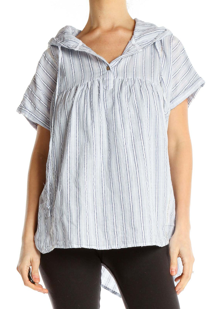 Front view of Doe & Rae white striped hooded blouse with empire waist