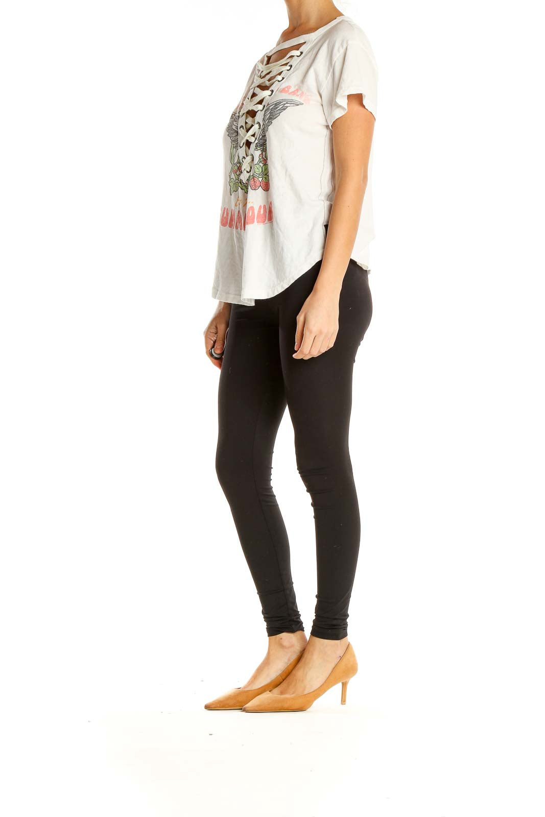 Front view of white Free People t-shirt with lace-up neckline and winged graphic design