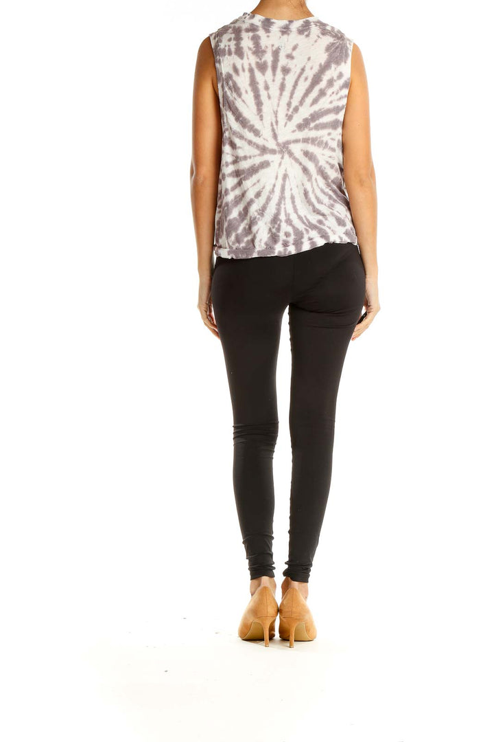 Back view of Free People purple and white tie-dye sleeveless top