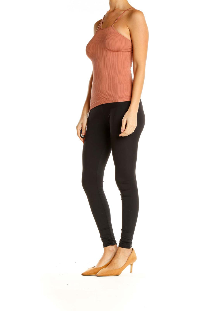 Front view of terracotta ribbed racerback tank top from Free People