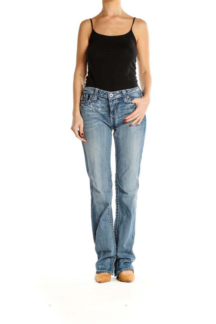 Front view of Big Star light blue distressed bootcut jeans on model