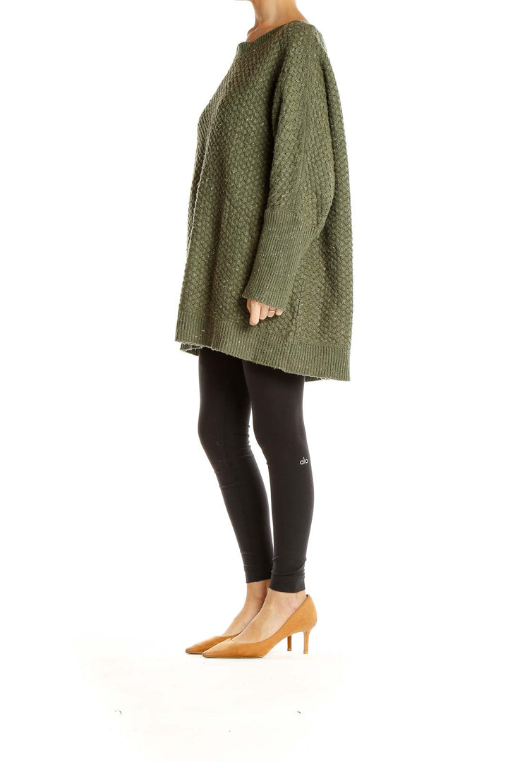Front view of olive green oversized textured knit sweater from Lane Bryant