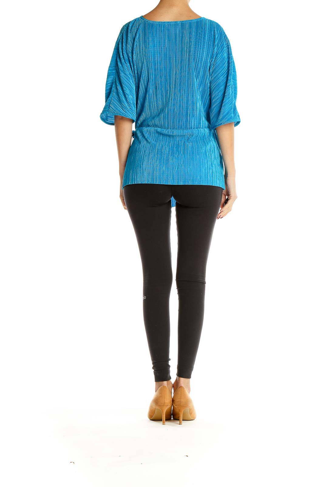 Side view of Halogen blue textured wrap-style blouse showing side tie detail