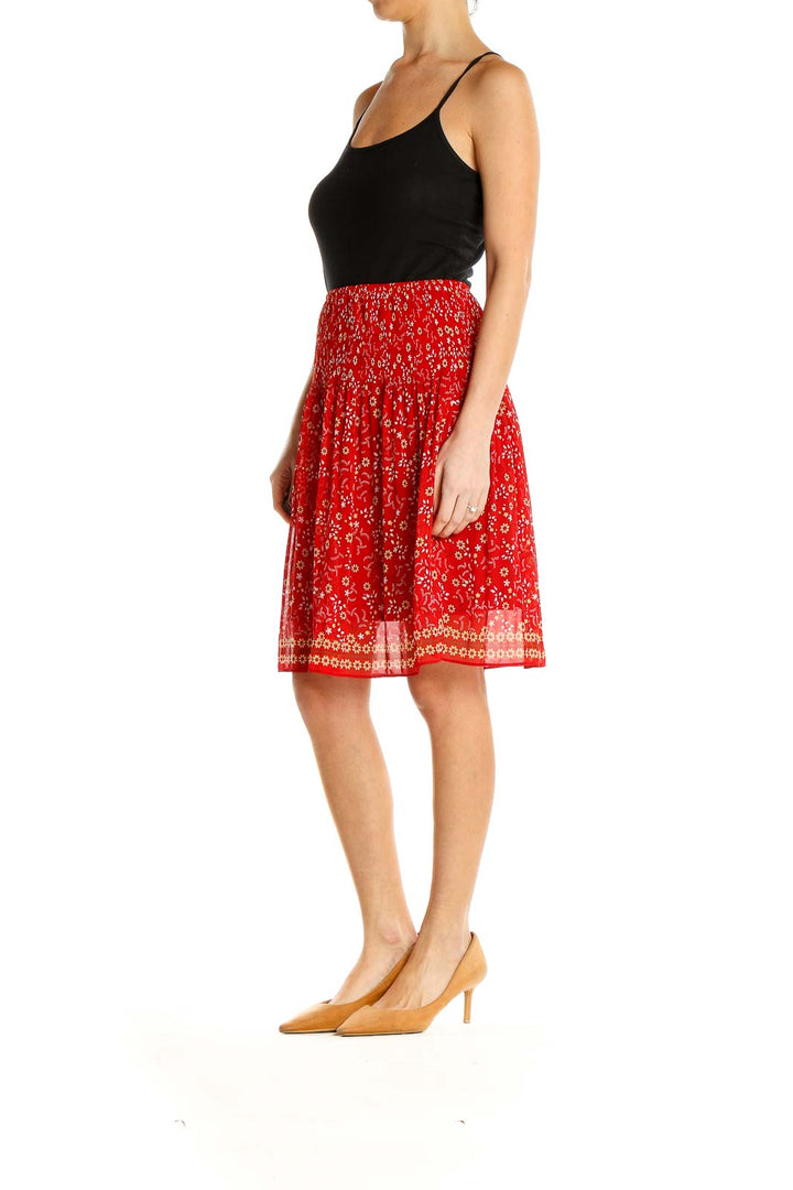 Front view of Max Studio red floral printed pleated midi skirt