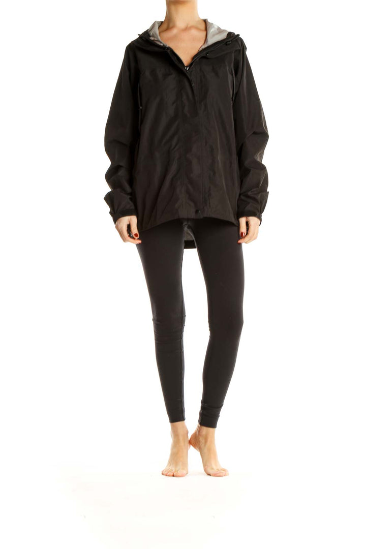 Front view of black L.L.Bean hooded rain jacket on model