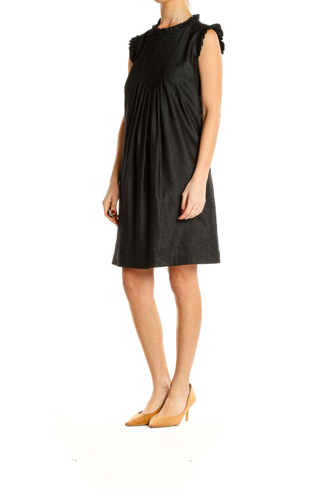 Front view of Tibi New York black polka dot pleated shift dress with high neckline