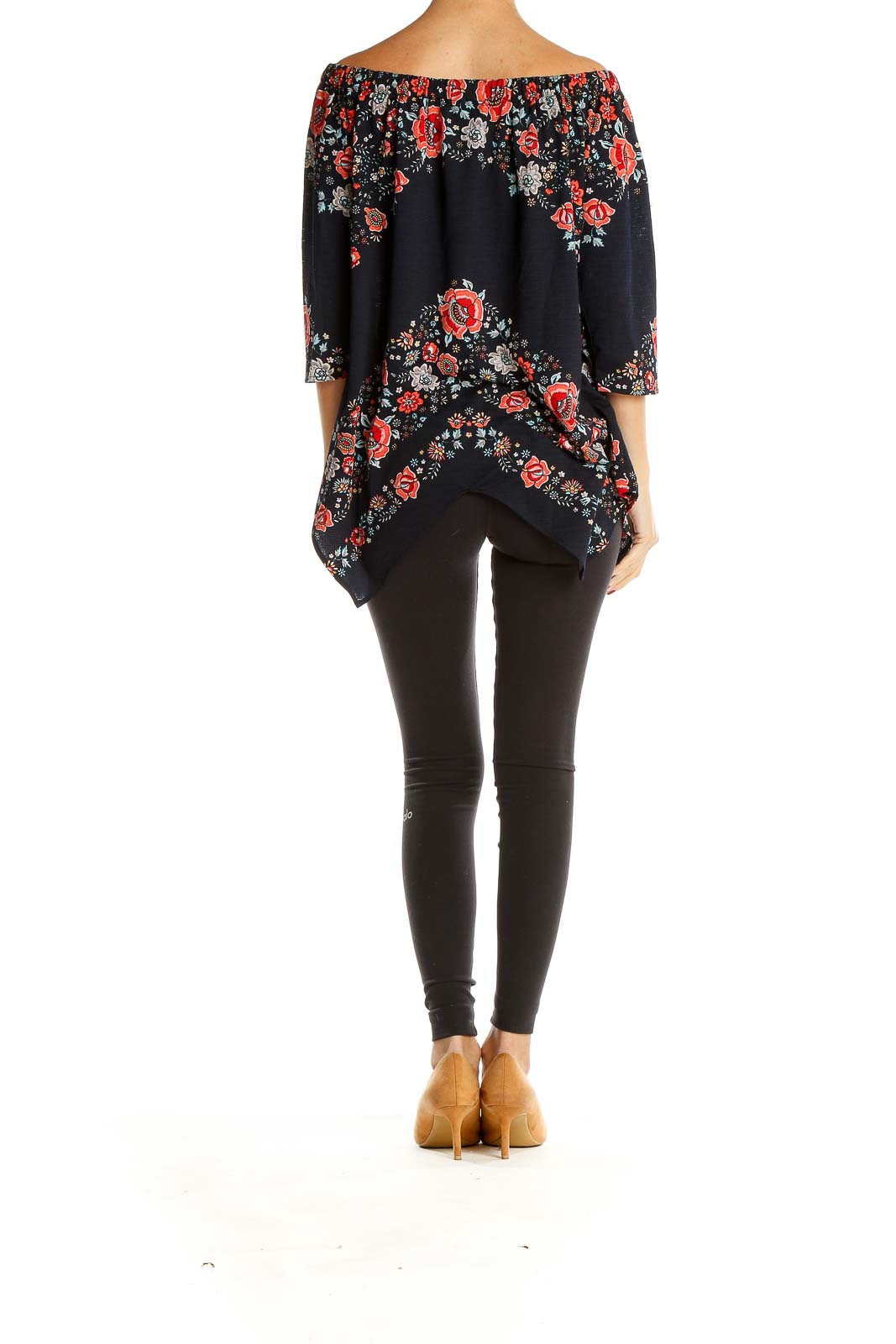 Side view of ECI black off-shoulder top with red floral print