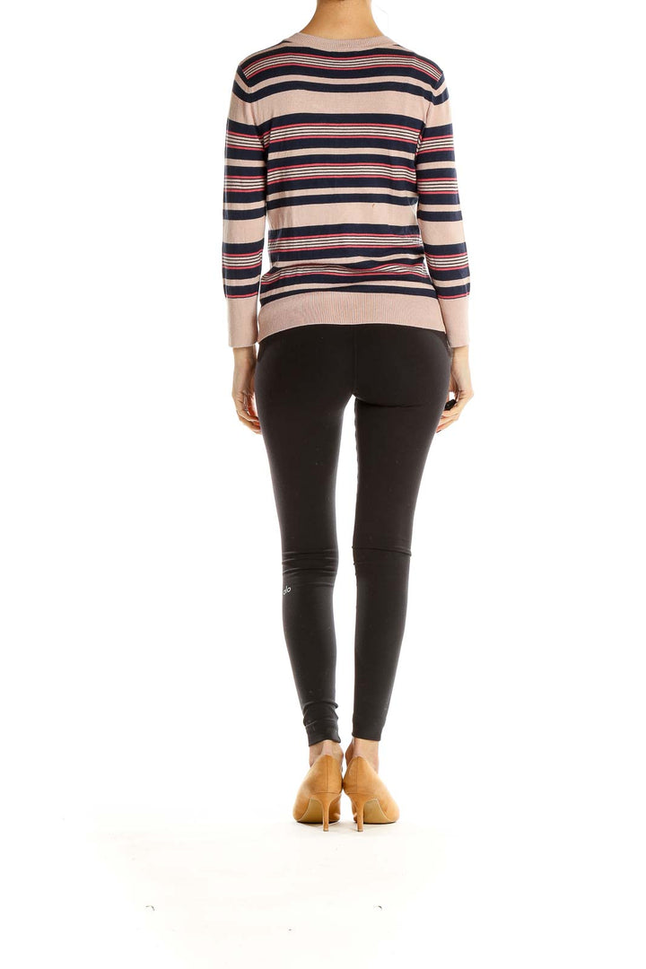 Side view of Halogen pink striped button-up cardigan on model