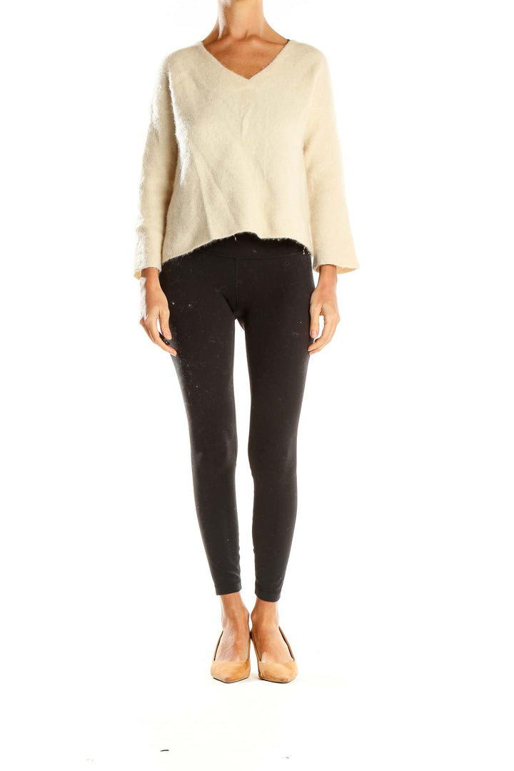 Front view of Eileen Fisher cream fuzzy knit V-neck sweater