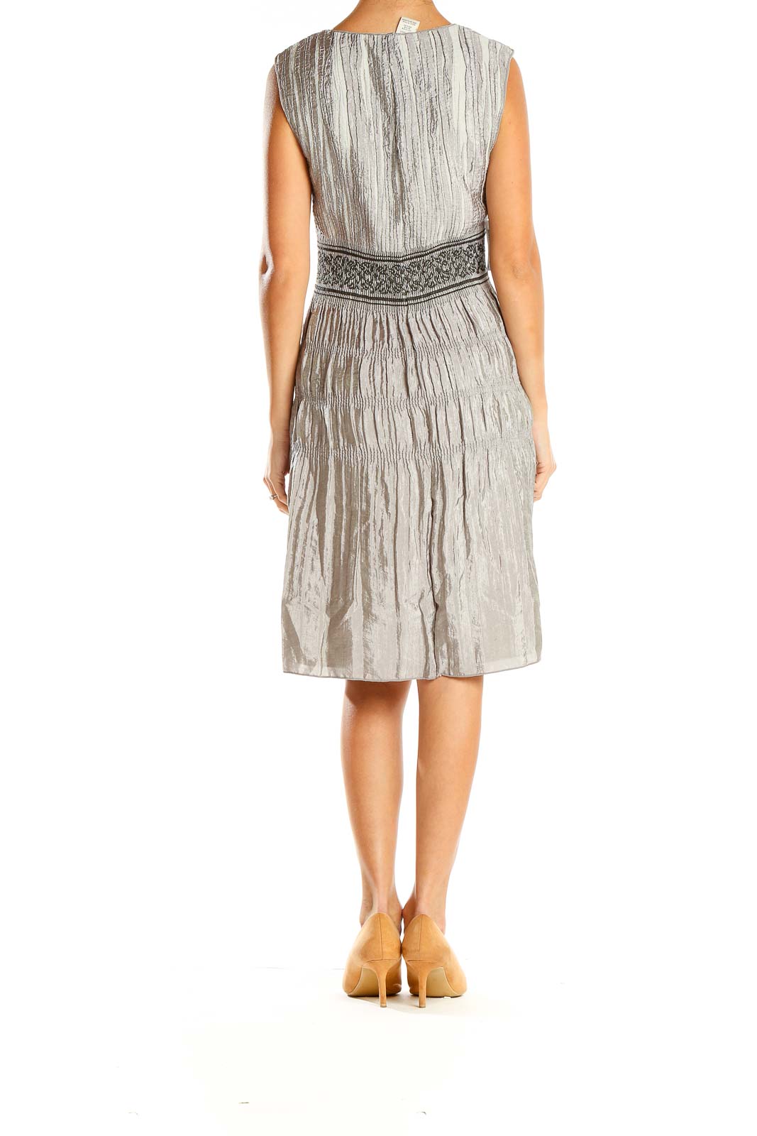 Side view of Max Studio silver crinkled dress showing tiered skirt
