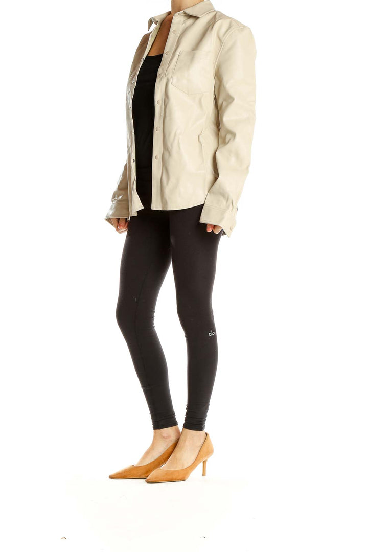 Front view of beige oversized button-up jacket from ASOS