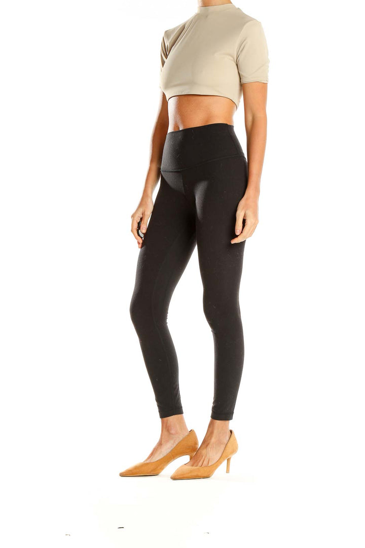 Front view of aexae beige cropped mock neck top