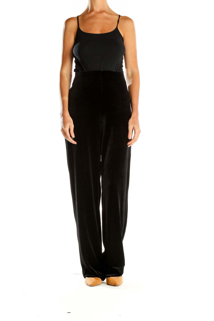 Front view of Max Studio black velvet wide-leg trousers on model