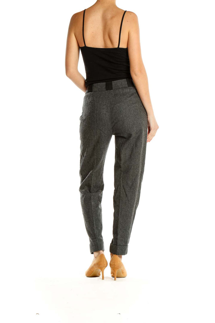 Side view of Karen Millen gray tailored trousers on model