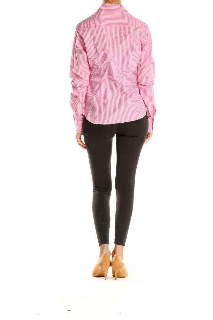Side view of Lilly Pulitzer pink striped button-down shirt on model