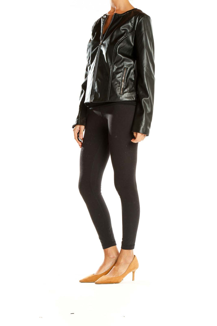 Front view of Premise Studio black faux leather zip-up jacket