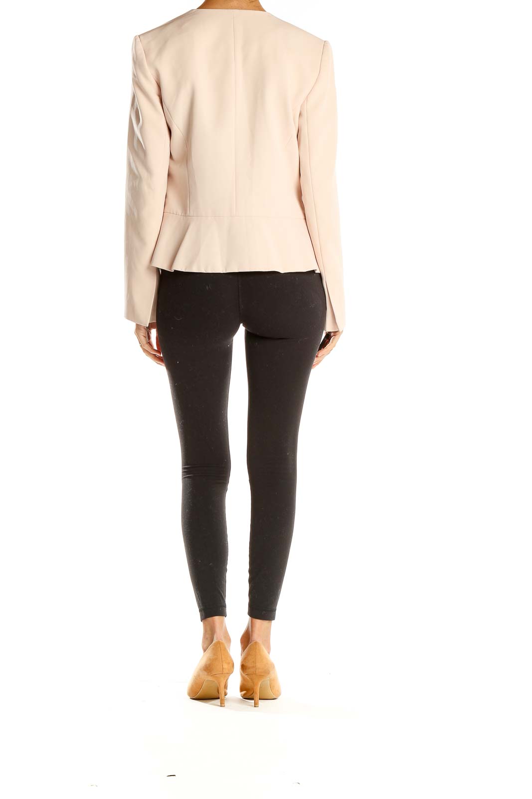 Side view of blush Halogen open-front blazer styled with black pants