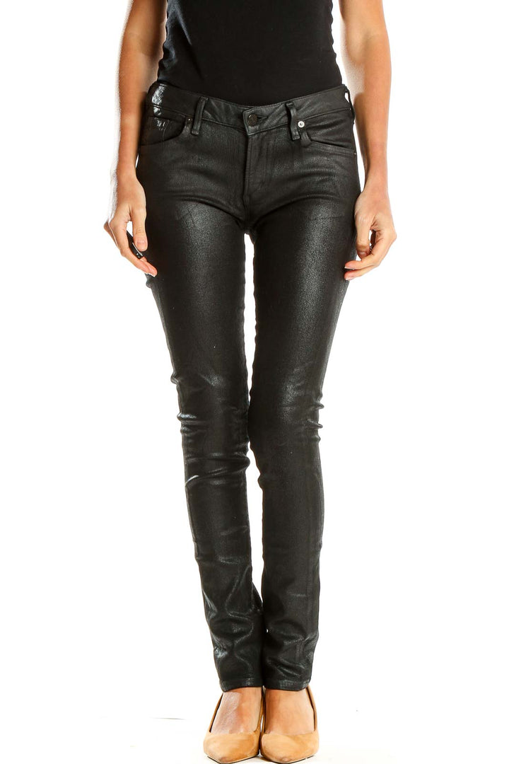 Front view of Citizens of Humanity black coated skinny jeans on model