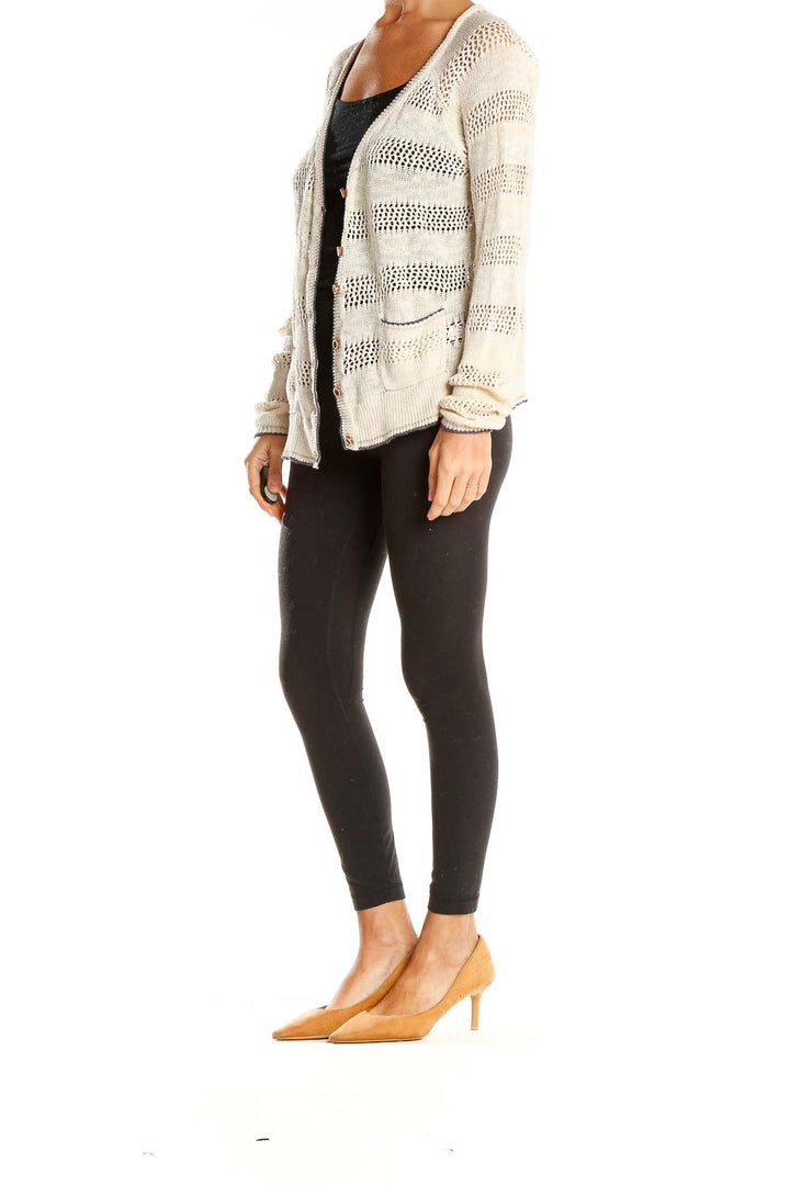 Front view of Lucky Brand cream striped open-knit cardigan with button closure