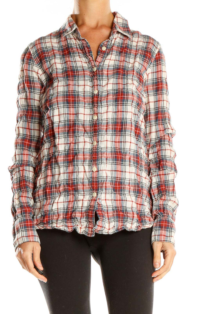 Front view of J.Crew red plaid cotton button-down shirt on model