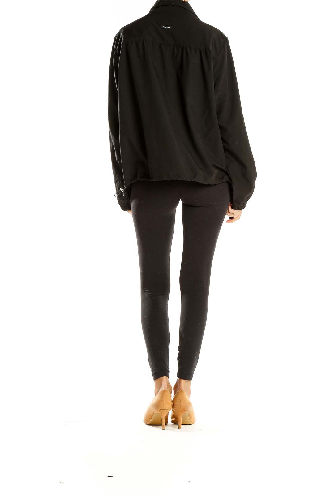 Back view of black Calvin Klein lightweight zip-up jacket on model