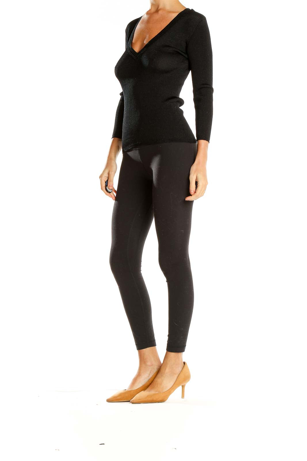 Front view of ICB black V-neck ribbed knit sweater on model