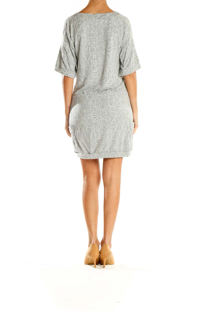 Side view of Armani Exchange gray dress showing geometric print and relaxed fit