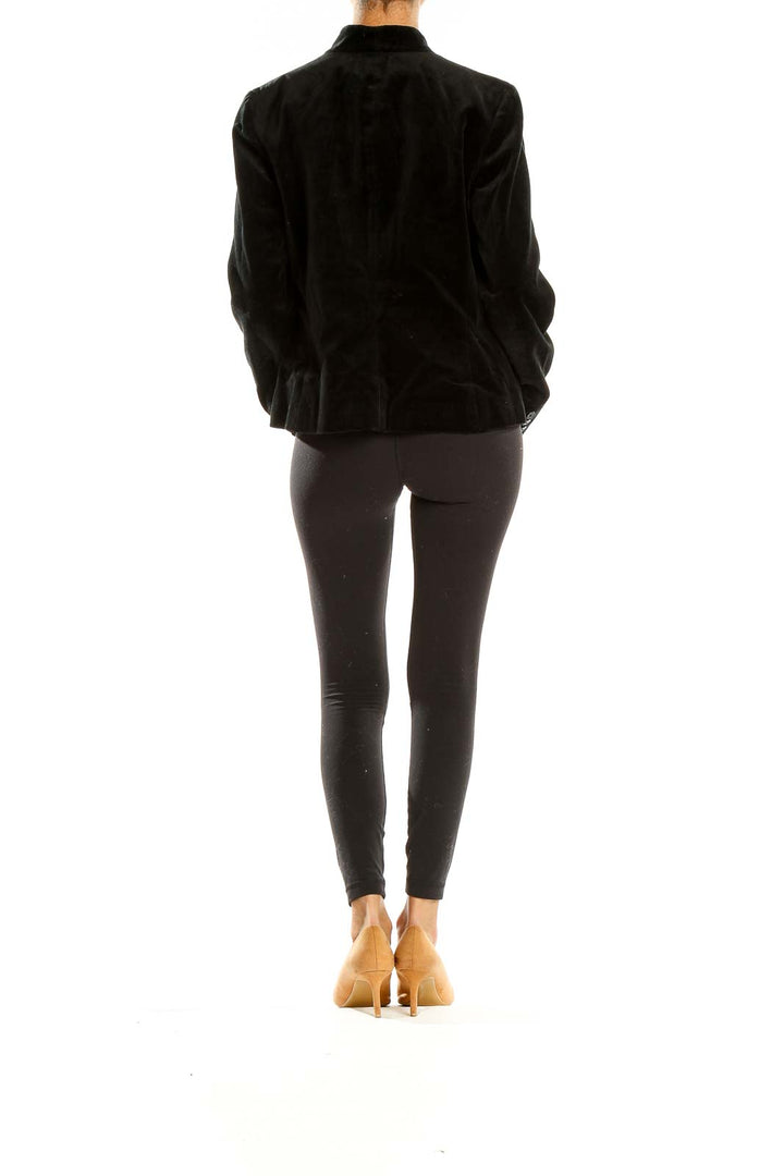 Side view of Lauren Ralph Lauren black velvet jacket on model