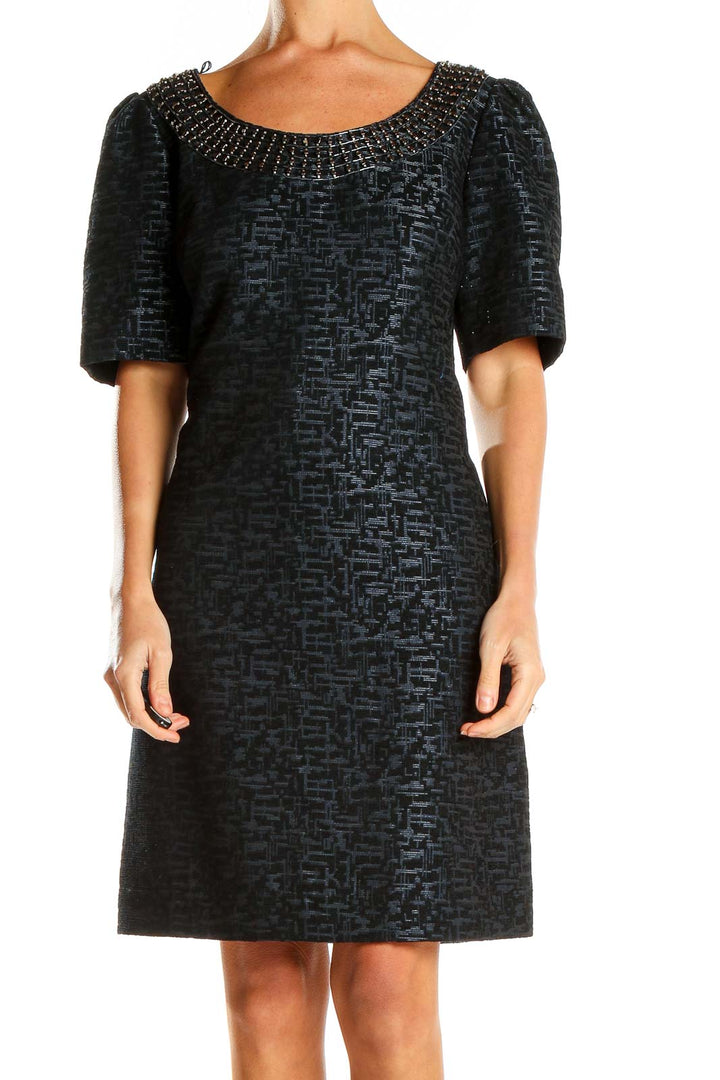 Front view of Adrianna Papell black textured cocktail dress with beaded neckline