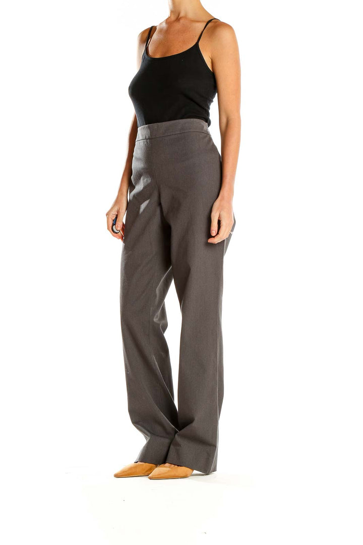 Front view of DKNY gray wide-leg trousers on model