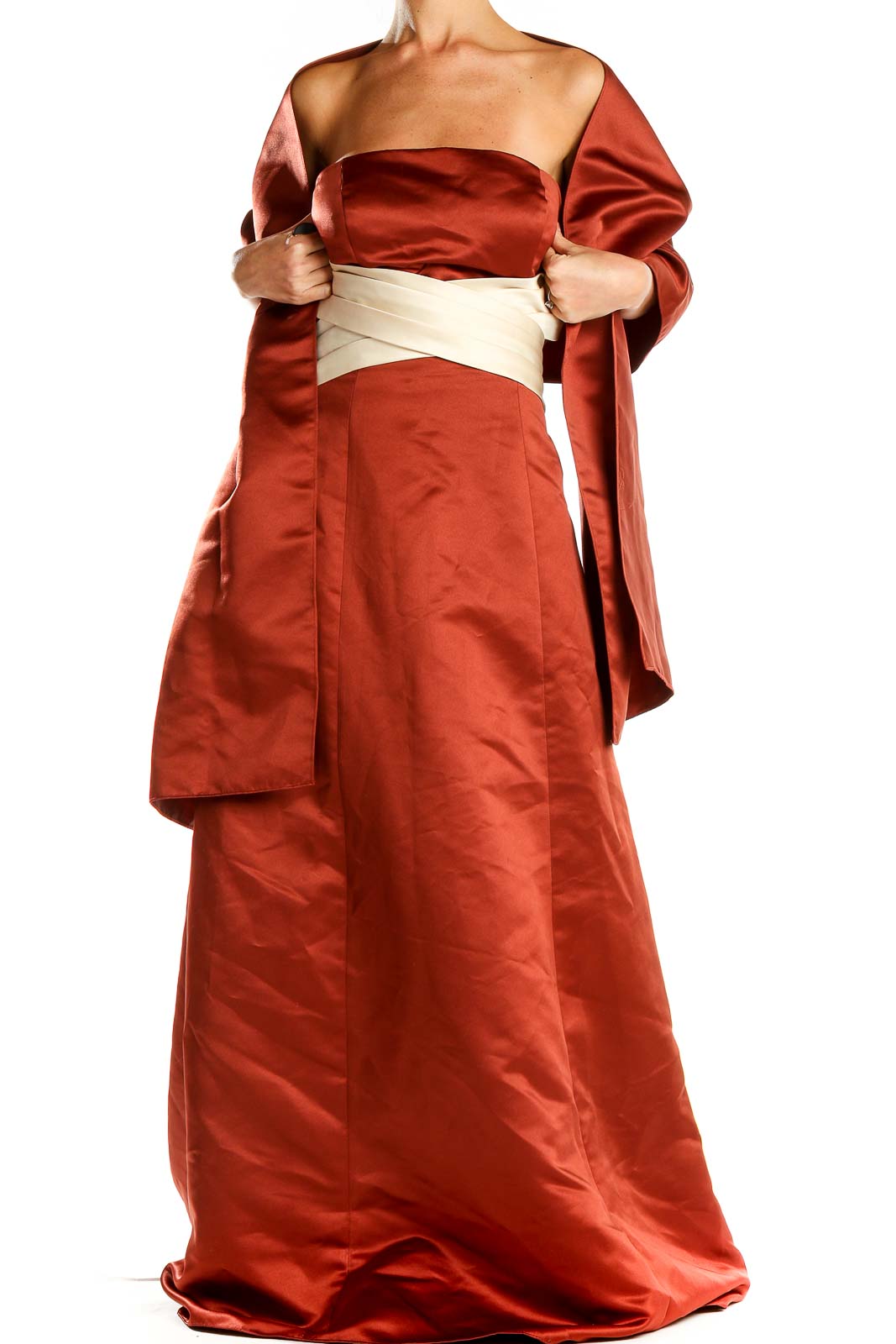 Front view of rust-colored Bill Levkoff strapless satin evening gown with cream sash