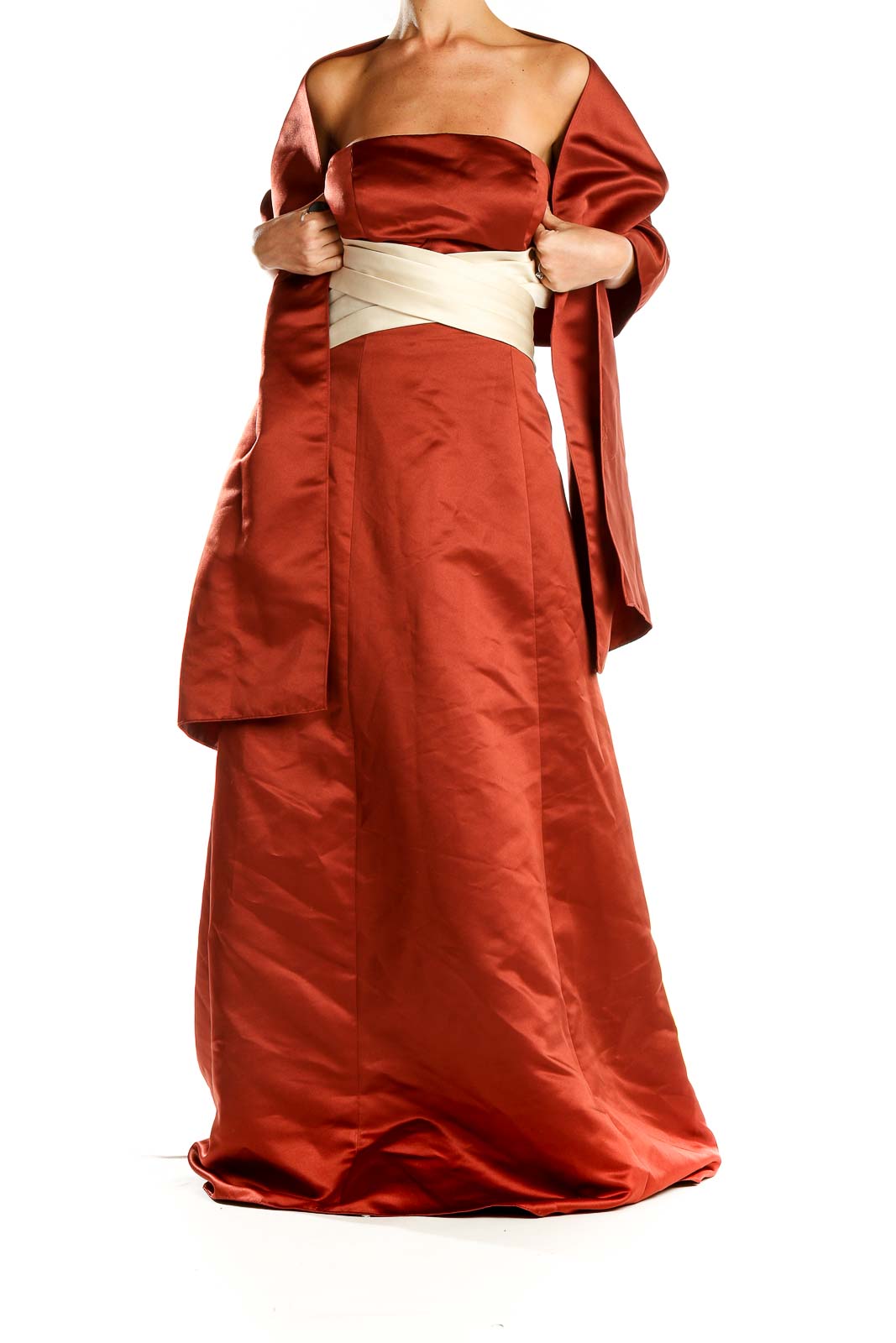 Front view of rust-colored Bill Levkoff strapless satin evening gown with cream sash