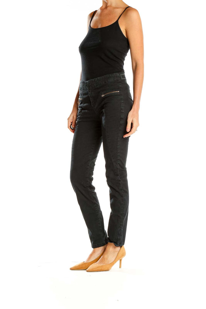 Front view of Rag & Bone black slim-fit pants with zipper details