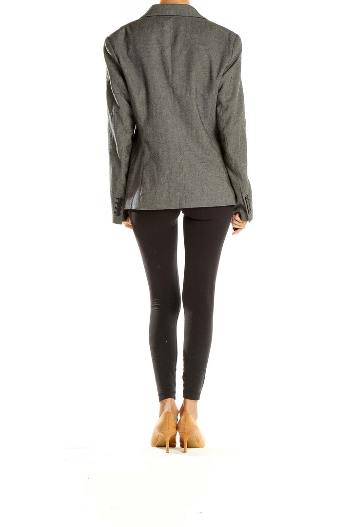 Side view of gray MICHAEL Michael Kors structured blazer on model