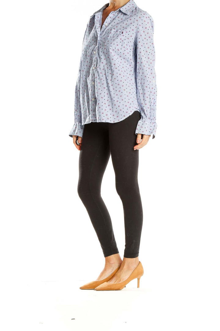 Front view of Tommy Hilfiger light blue floral print button-up shirt