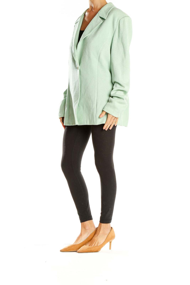 Front view of mint green St. John oversized blazer jacket