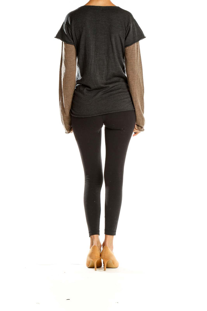 Side view of Athleta charcoal layered top showing contrasting long sleeves