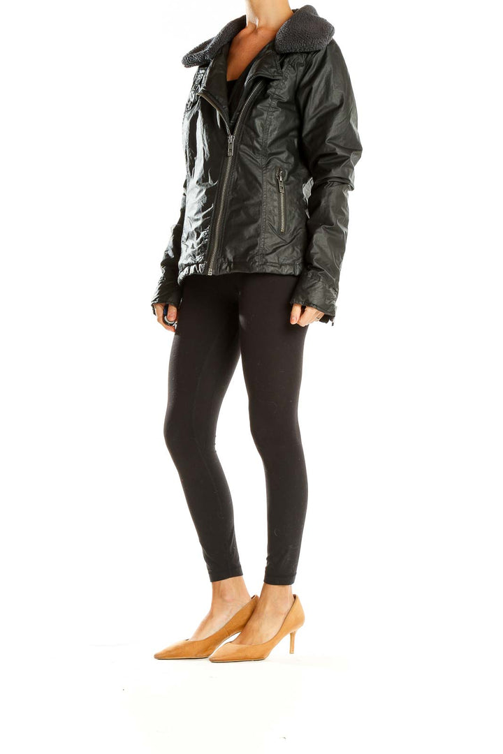 Front view of black faux leather moto jacket by Bench with sherpa collar