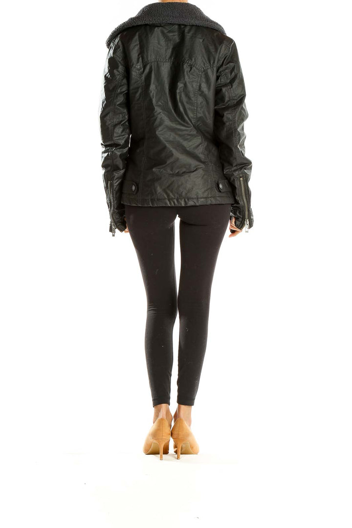Side view of black Bench moto jacket showing fitted silhouette and zipper details