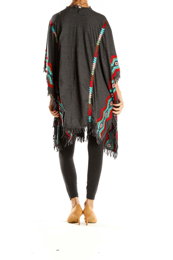 Back view of Scully gray knit cardigan showing full Southwestern pattern and fringe hem