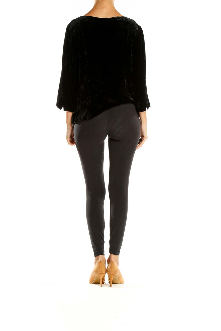 Back view of Talbots black velvet blouse showing elegant drape and fit