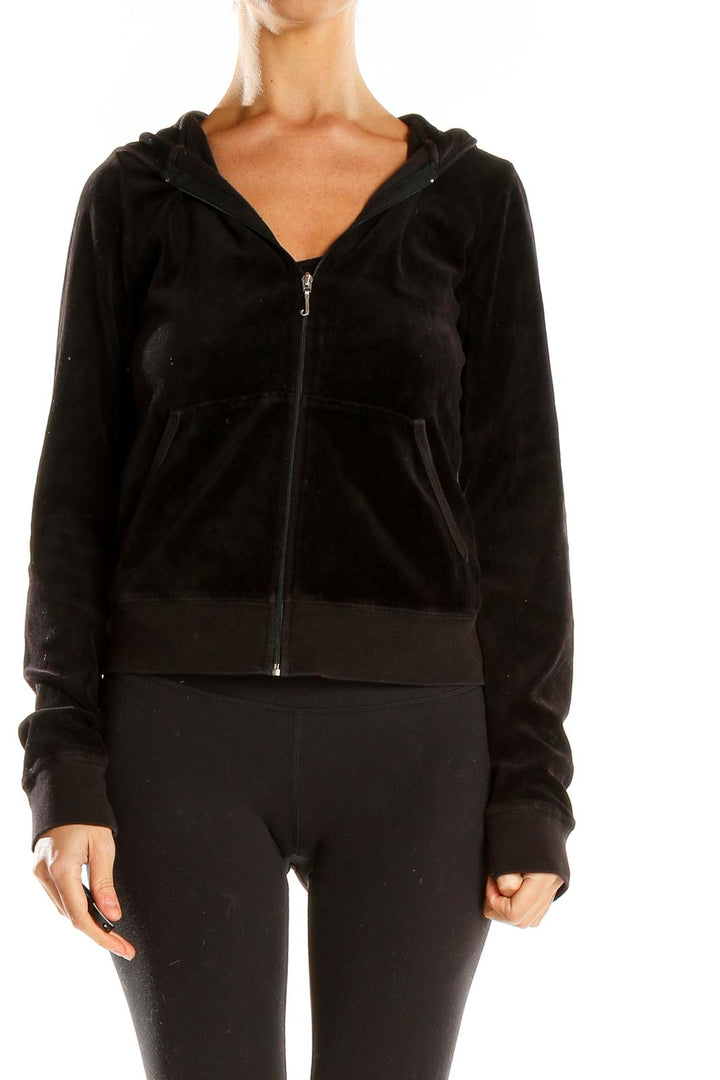 Front view of Juicy Couture black velour zip-up hoodie jacket